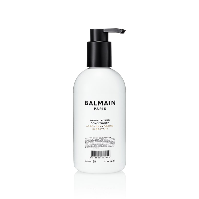 <img src="balmain-moisturizing-conditioner.jpg" alt="Balmain Moisturizing Conditioner bottle with sleek packaging designed for smooth, hydrated hair" />