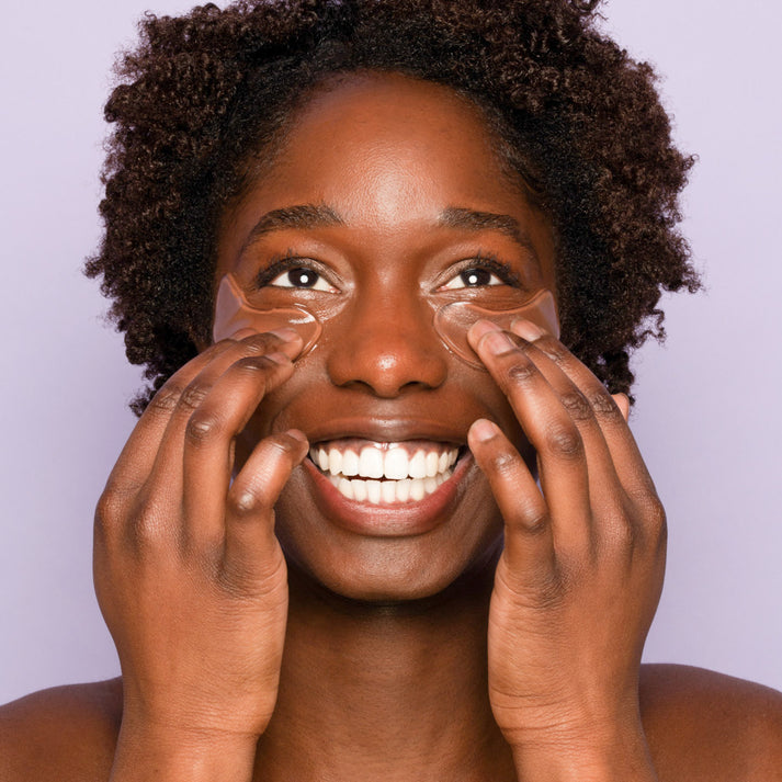 Applying Frownies Under Eye Gels to reduce puffiness and fine lines