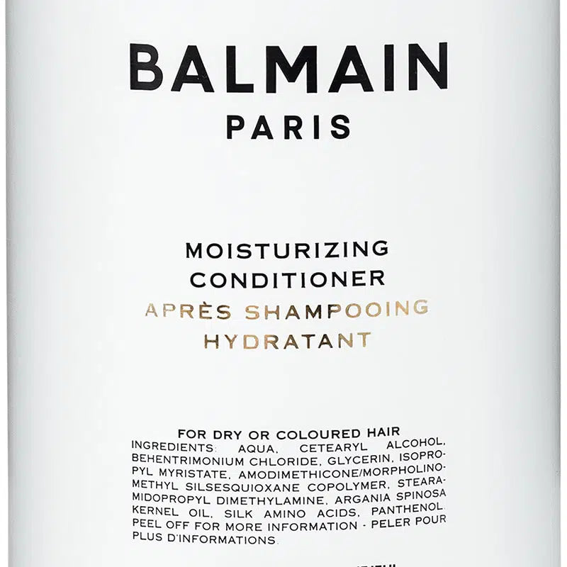 <img src="balmain-moisturizing-conditioner.jpg" alt="Balmain Moisturizing Conditioner bottle with sleek packaging designed for smooth, hydrated hair" />
