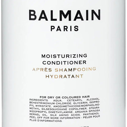 <img src="balmain-moisturizing-conditioner.jpg" alt="Balmain Moisturizing Conditioner bottle with sleek packaging designed for smooth, hydrated hair" />
