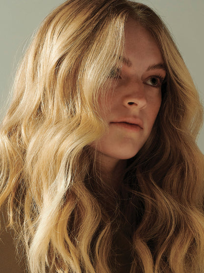 Hair with added volume after using AG Care Simply Dry Shampoo