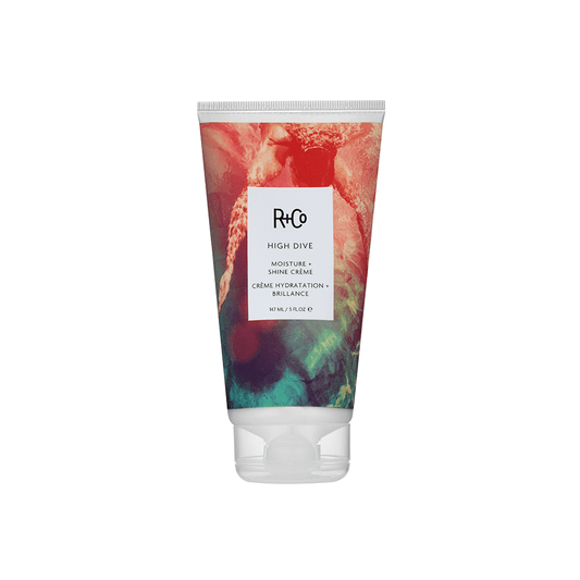 HIGH DIVE Moisture + Shine Crème product displayed on a white background, showcasing the sleek packaging and highlighting its hydrating and frizz-controlling benefits