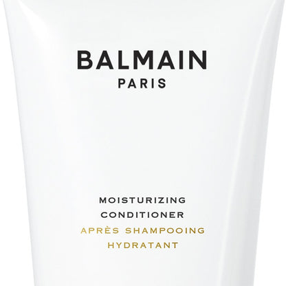 Close up of the label of Travel Size Balmain Moisturizing Conditioner.